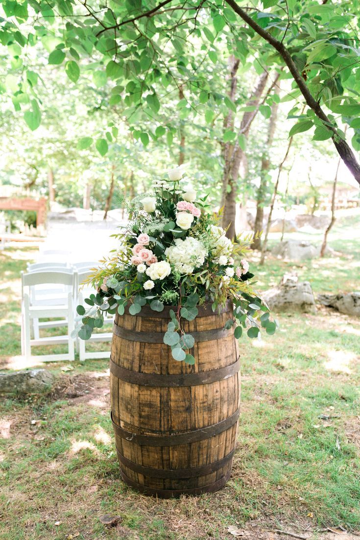 Barrel table used as wedding decor for an outdoor wedding in the Sandhills